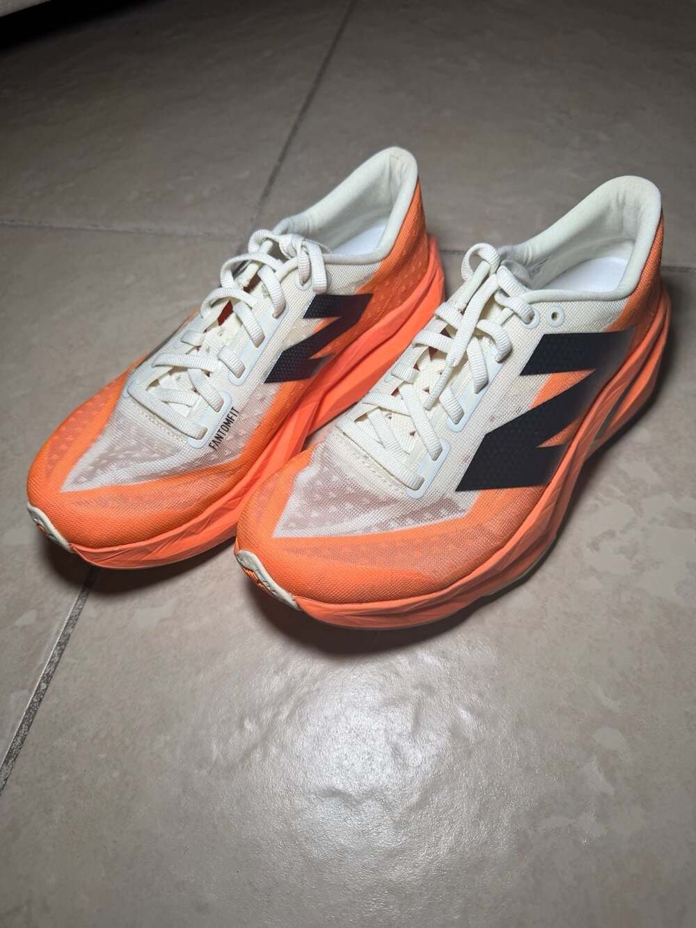 New Balance FuelCell Rebel v4 Hot Mango Angora Running Shoes WFCXCC4